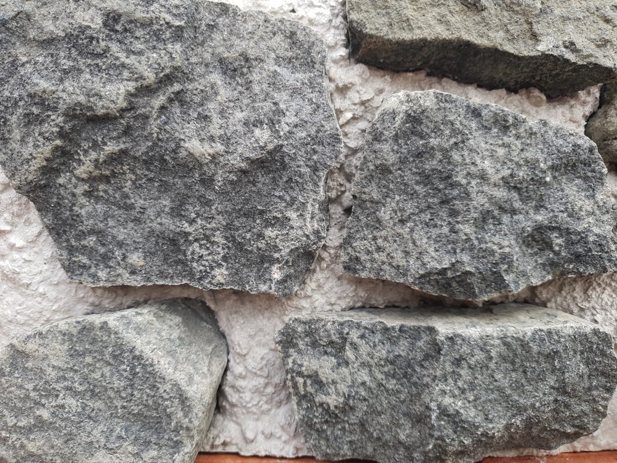Close up photo of a Basalt stone block.