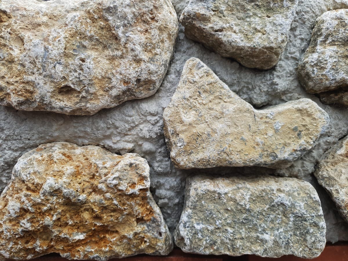 Close up photo of a forest marble stone blocks.