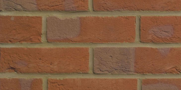 A photo of the Forterra EcoStock Autumn Glow Multi 65mm brick in use.
