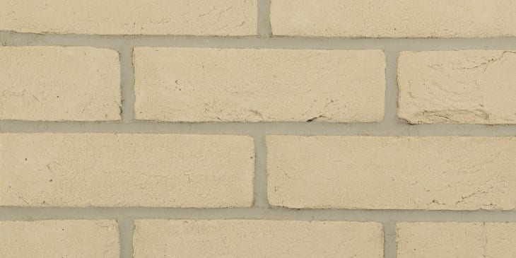 A photo of the Forterra EcoStock Kensington Cream 65mm brick in use.