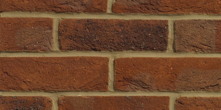 A photo of the Forterra EcoStock Westcroft Red Multi 65mm brick in use.