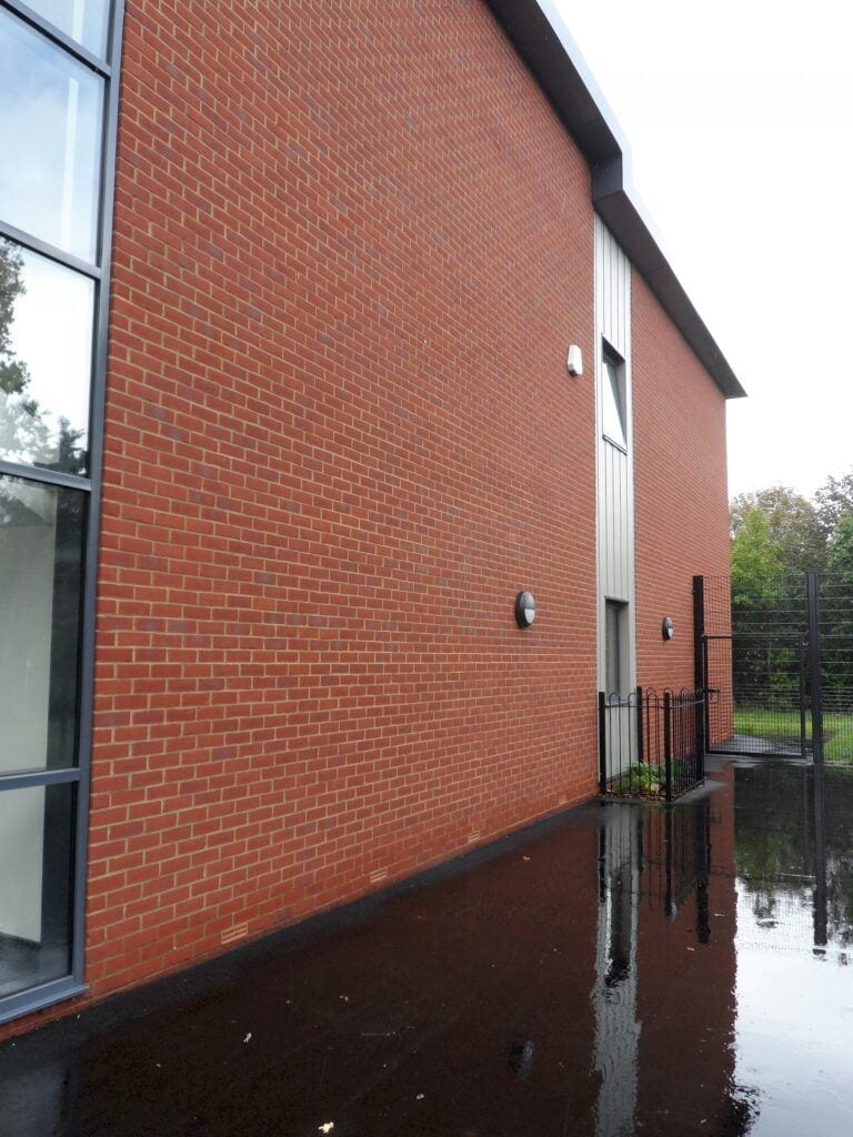 A photo of the Camtech Premier Anglian Red Stock brick in use.