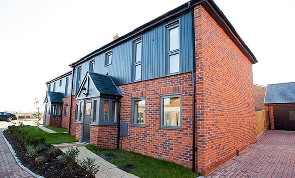 A photo of the Camtech Premier Manor Red Multi Stock brick in use.