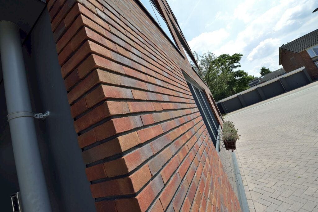 A photo of the Camtech Premier Red Multi Stock brick in use.