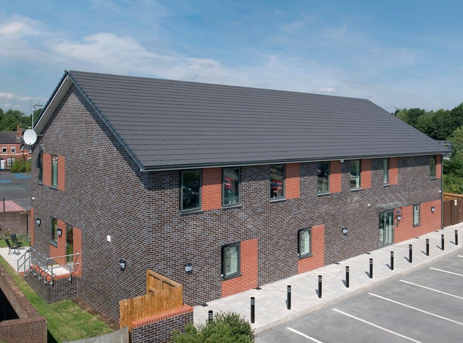 A photo of the MBH Blockley Hadley Red Smooth brick in use.