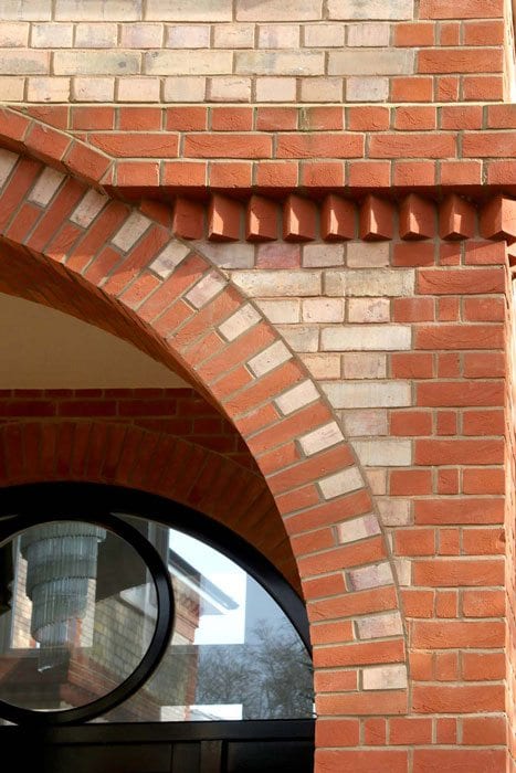 A photo of the MBH Charnwood Light Victorian Red Handmade brick in use.