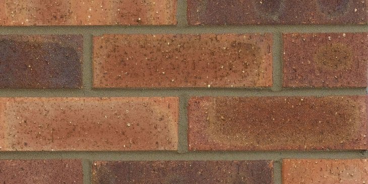 A photo of the Forterra Butterley Edwardian Dragfaced brick in use.