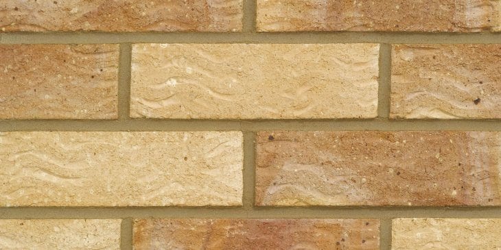 A photo of the Forterra Butterley Old English Buff Multi brick in use.