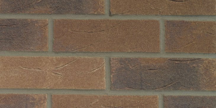 A photo of the Forterra Butterley Old English Russet brick in use.
