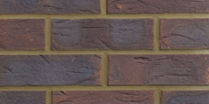 A photo of the Forterra Butterley Village Russet Red Mixture brick in use.